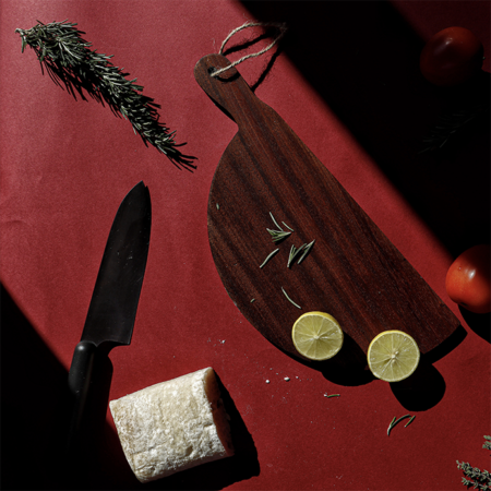 semi circular mahogany wood cutting board