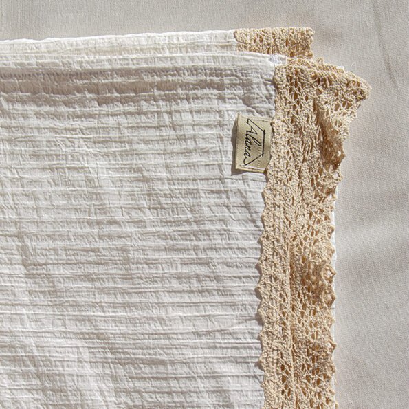 white cotton bed throw